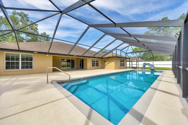 6307 SE 8th Ln, Ocala, FL 34472 - swimming pool with a patio area and glass enclosure