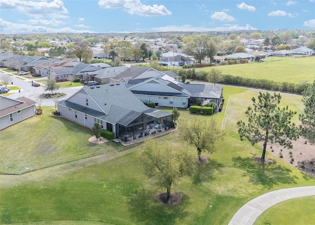 birds eye view of property with a residential view