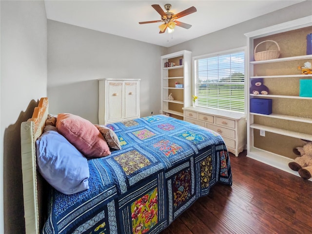 bedroom featuring dark wood-style floors and ceiling fan