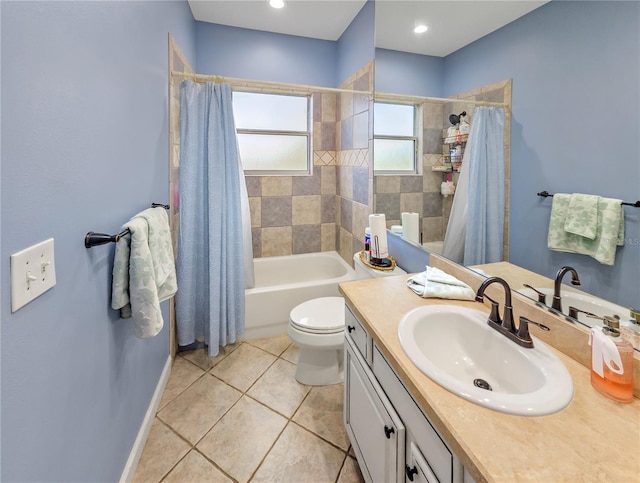 full bathroom featuring shower / tub combo with curtain, toilet, vanity, tile patterned flooring, and baseboards