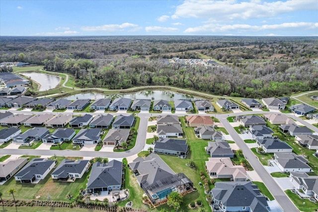 aerial view with a water view and a residential view