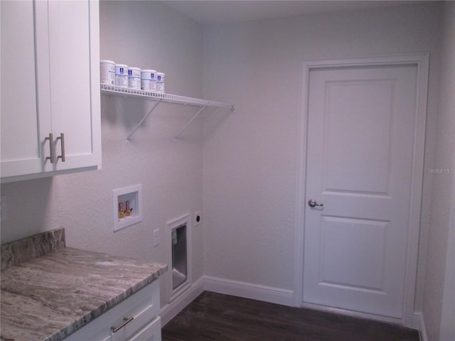 laundry area featuring hookup for an electric dryer, cabinet space, baseboards, dark wood-type flooring, and washer hookup