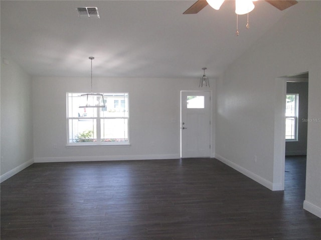 interior space featuring a wealth of natural light and dark wood-type flooring