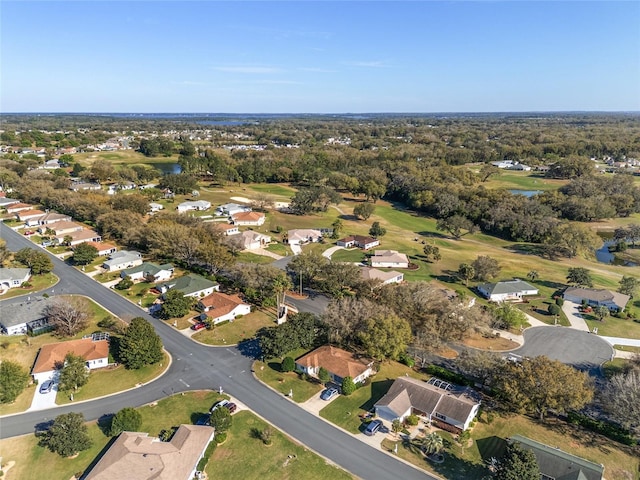 aerial view with a residential view and view of golf course