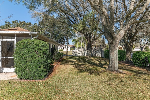 view of yard with fence