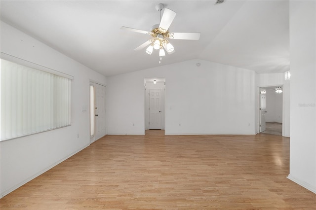 unfurnished living room featuring lofted ceiling, a ceiling fan, and light wood finished floors