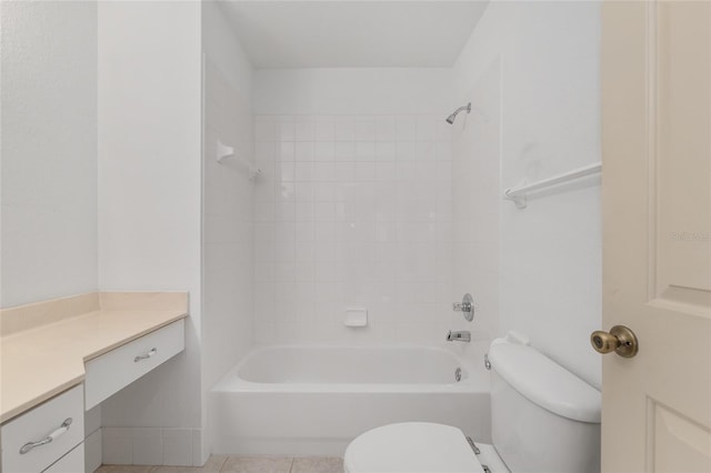 bathroom featuring vanity, tile patterned floors, toilet, and shower / bath combination