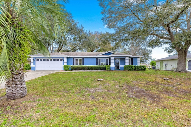 ranch-style house with a front lawn, concrete driveway, an attached garage, and stucco siding