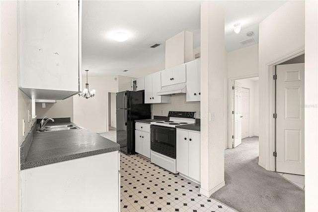 kitchen with range with electric stovetop, dark countertops, white cabinetry, a sink, and under cabinet range hood