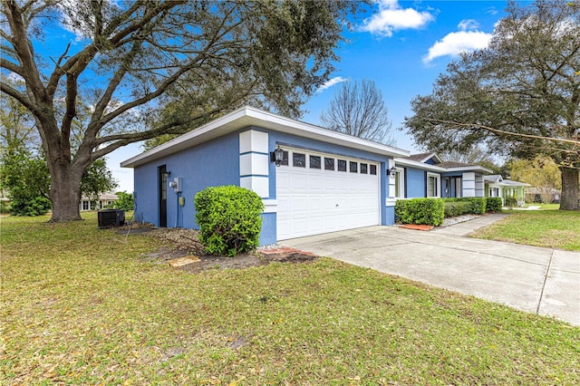 garage with concrete driveway