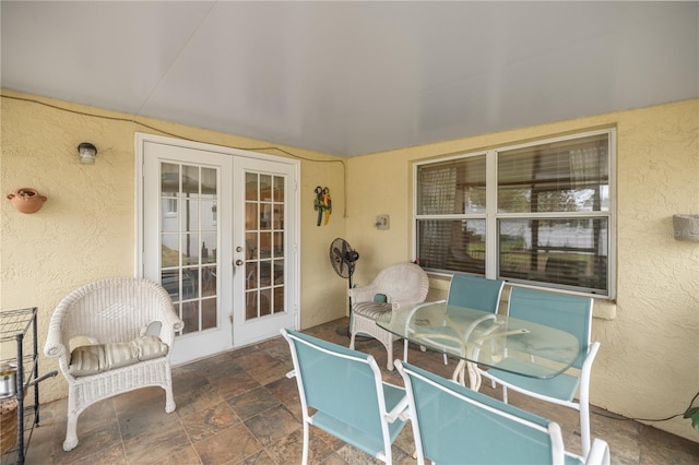 view of patio with french doors and outdoor dining area