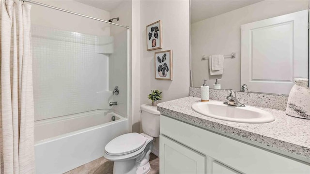 full bath with shower / bathtub combination with curtain, toilet, and vanity