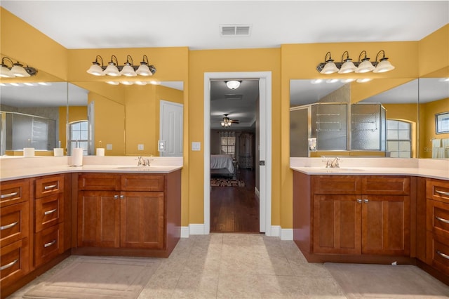 full bath with a stall shower, visible vents, ensuite bath, tile patterned floors, and vanity