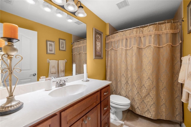 full bathroom with toilet, tile patterned flooring, visible vents, and vanity