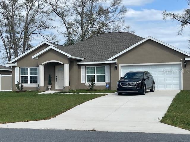 single story home with roof with shingles, stucco siding, a garage, driveway, and a front lawn