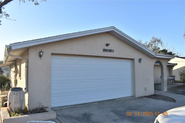 garage with driveway