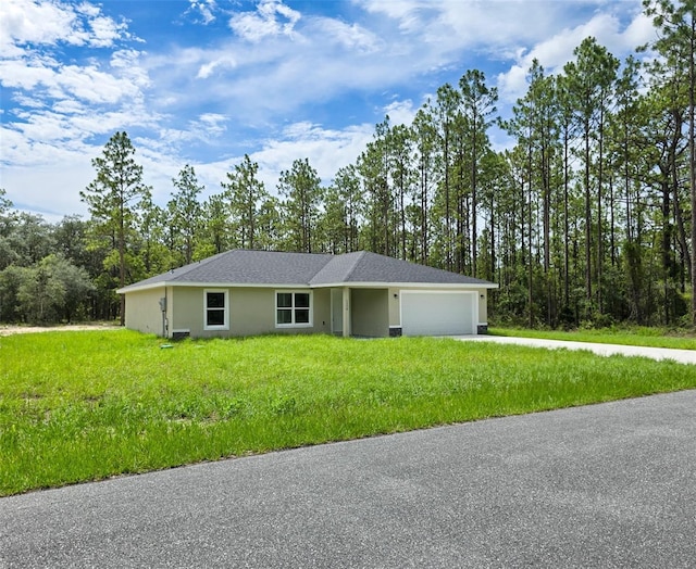 1370 SW Obee Ridge Rd, Dunnellon, FL 34432 - ranch-style home with an attached garage, stucco siding, a front yard, and driveway