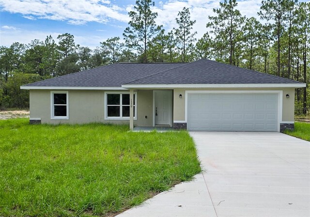 1370 SW Obee Ridge Rd, Dunnellon, FL 34432 - single story home featuring roof with shingles, stucco siding, driveway, and an attached garage