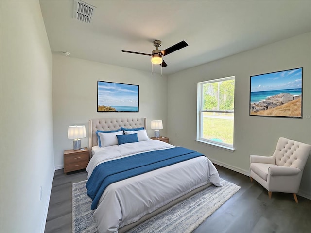 1370 SW Obee Ridge Rd, Dunnellon, FL 34432 - bedroom with wood finished floors and ceiling fan