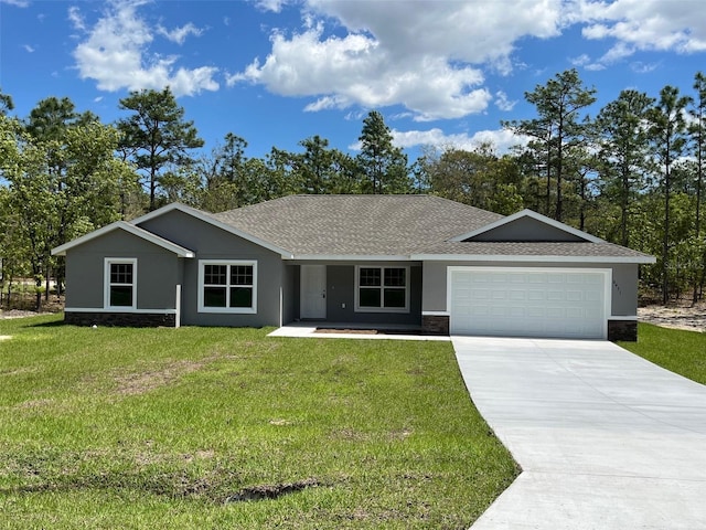 ranch-style home featuring a front yard, driveway, stucco siding, a garage, and stone siding