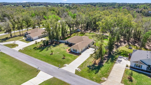 bird's eye view with a forest view