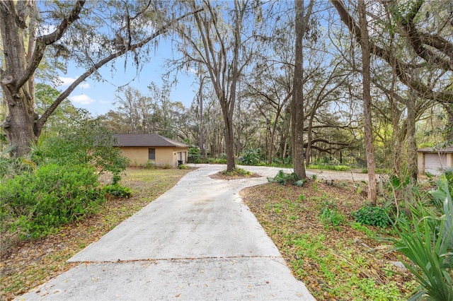 exterior space featuring driveway