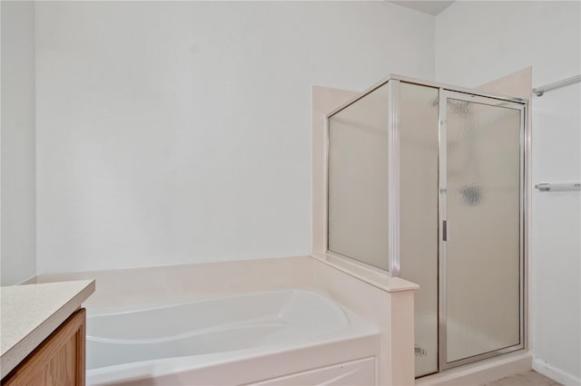 4954 SW 40th Pl, Ocala, FL 34474 - full bath featuring a shower stall, a garden tub, and vanity