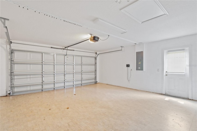 4954 SW 40th Pl, Ocala, FL 34474 - garage featuring electric panel and a garage door opener