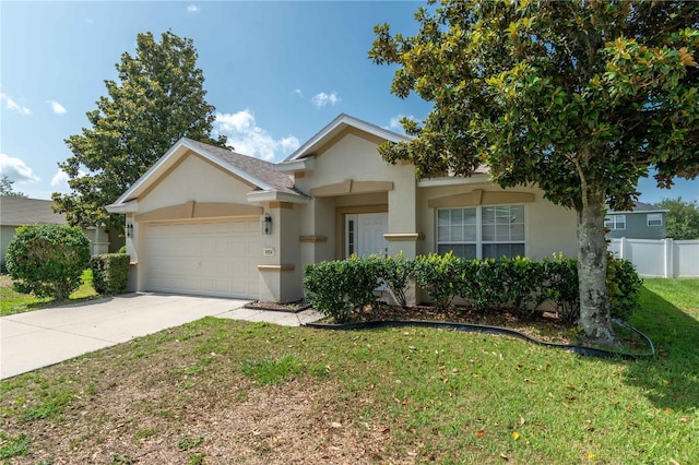 4954 SW 40th Pl, Ocala, FL 34474 - view of front of house with stucco siding, a garage, and concrete driveway