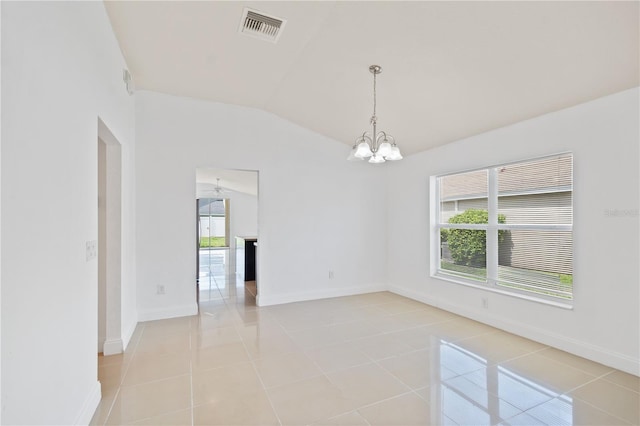 4954 SW 40th Pl, Ocala, FL 34474 - empty room featuring a chandelier, vaulted ceiling, light tile patterned floors, and baseboards