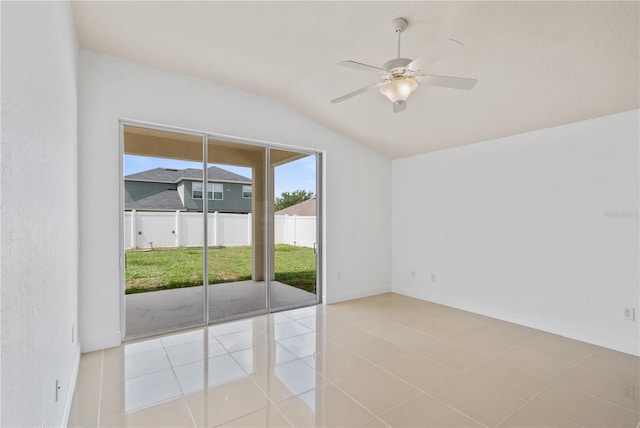 4954 SW 40th Pl, Ocala, FL 34474 - tiled empty room with lofted ceiling, a ceiling fan, and baseboards