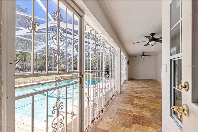 unfurnished sunroom featuring plenty of natural light