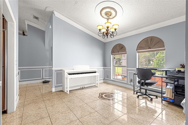 office with crown molding, visible vents, a decorative wall, and a notable chandelier