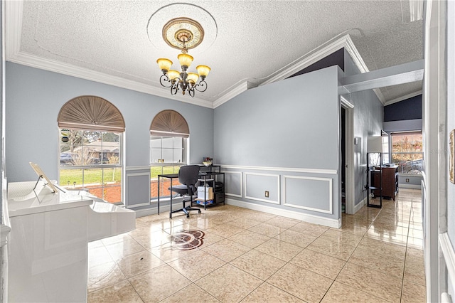 tiled office space with wainscoting, an inviting chandelier, a textured ceiling, crown molding, and a decorative wall