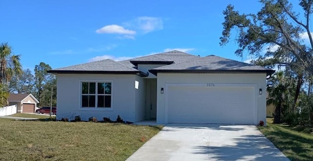 ranch-style house featuring a garage, concrete driveway, a front lawn, and stucco siding