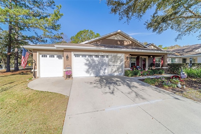 ranch-style home with an attached garage, driveway, a front lawn, and stucco siding