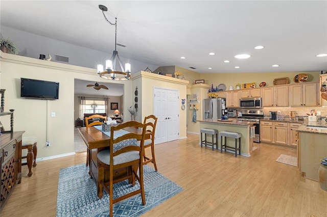 dining area featuring a chandelier, recessed lighting, visible vents, baseboards, and light wood finished floors