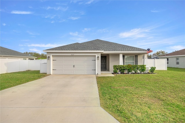 ranch-style home with concrete driveway, an attached garage, fence, a front lawn, and stucco siding