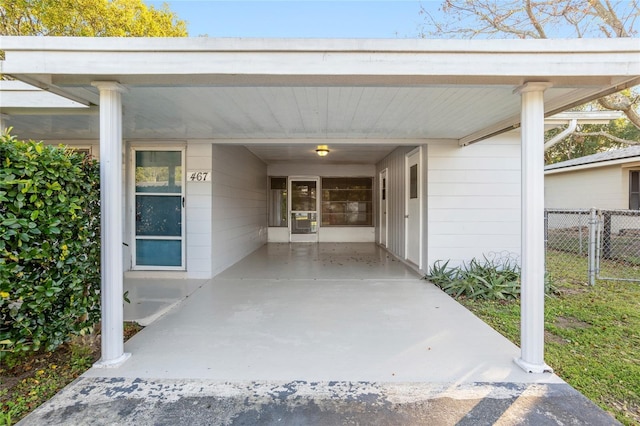 property entrance with fence