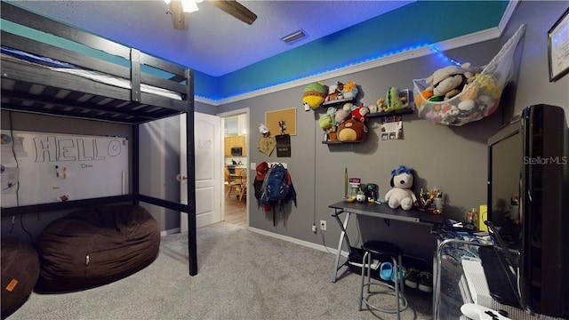 carpeted bedroom featuring visible vents, ceiling fan, and baseboards