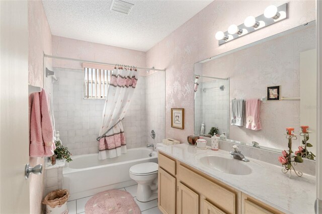 full bathroom with visible vents, toilet, shower / tub combo, a textured ceiling, and tile patterned floors