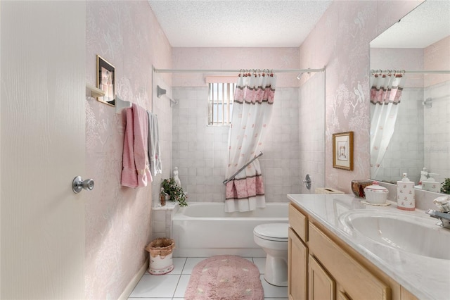 full bath featuring shower / bath combo, toilet, tile patterned flooring, a textured ceiling, and vanity