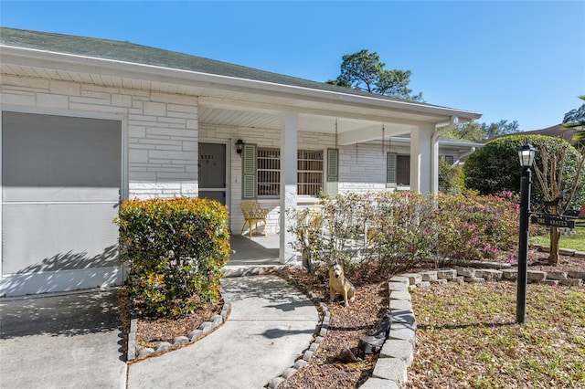 property entrance with a porch