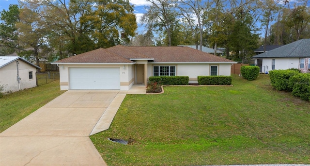 single story home with driveway, an attached garage, fence, a front lawn, and stucco siding