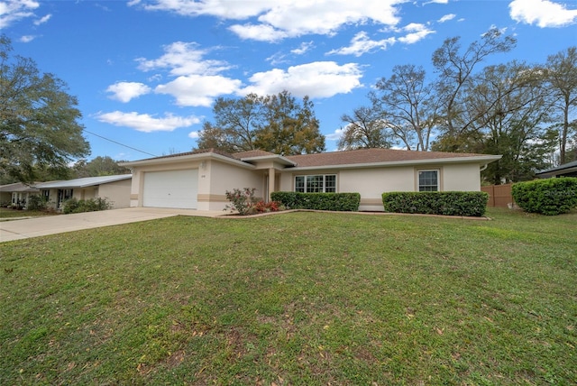 single story home featuring stucco siding, an attached garage, fence, driveway, and a front lawn