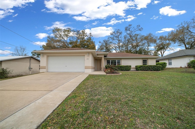 view of front facade featuring a garage, a front yard, concrete driveway, and stucco siding