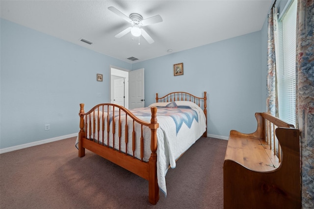 bedroom featuring carpet, visible vents, and baseboards