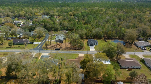 bird's eye view with a forest view