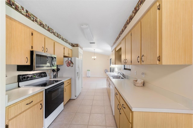 kitchen featuring light brown cabinets, a sink, white appliances, an inviting chandelier, and light tile patterned flooring