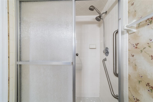 full bathroom featuring a shower stall